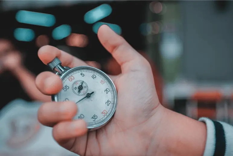 Person holding a timer