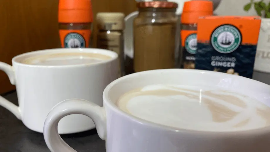 Dirty chai lattes in white mugs.