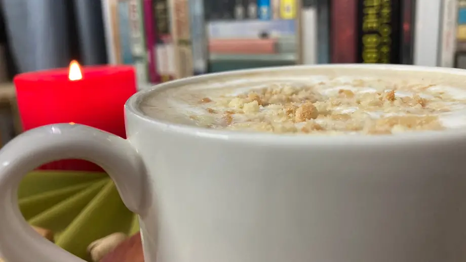 Pistachio latte in white mug