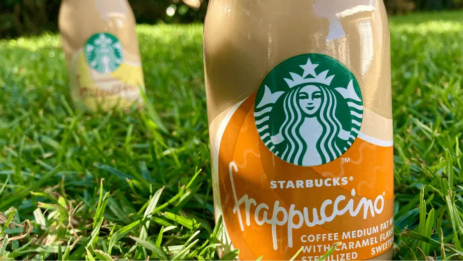 Starbucks bottled frappuccinos on glass.