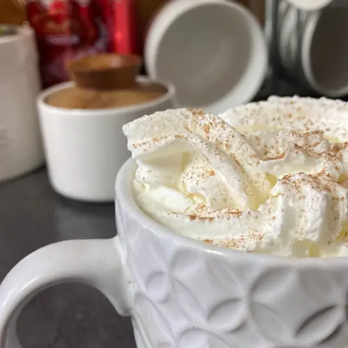 Snickerdoodle Latte in white textured mug.