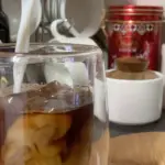 Iced coffee in a double walled glass