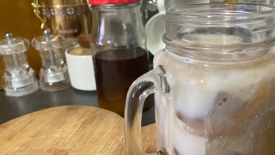 Iced honey cinnamon latte in a glass